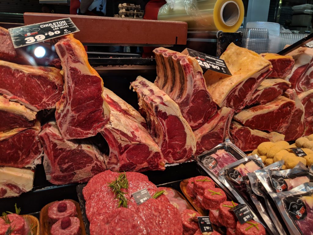 Steaks on display at La Boqueria